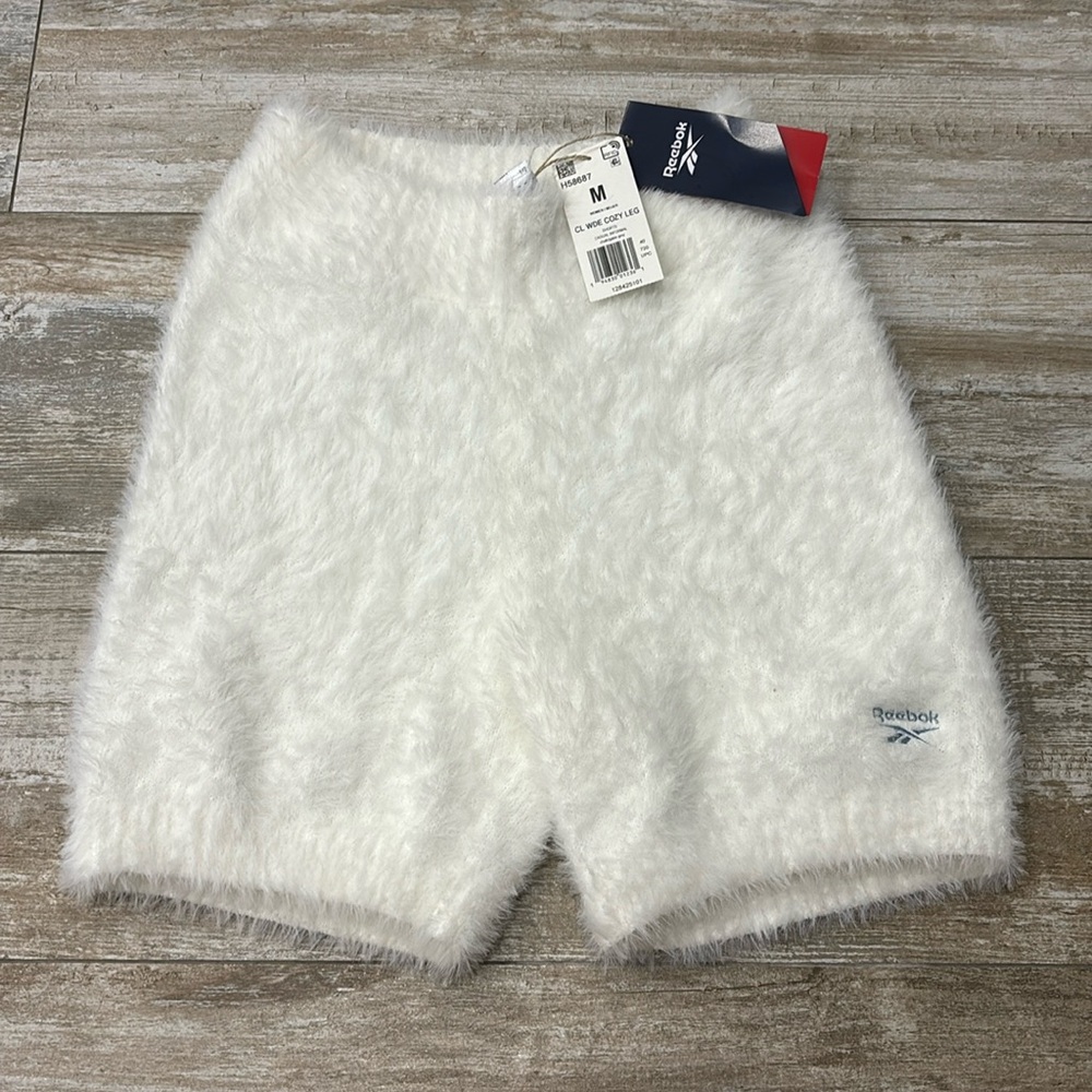 Fuzzy white Reebok biker shorts